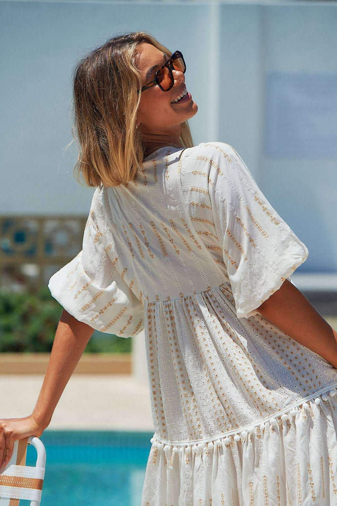 Back view of Seashell Palace Boho Midi Dress with balloon sleeves and relaxed silhouette. Lightweight and breezy for warm weather wear.