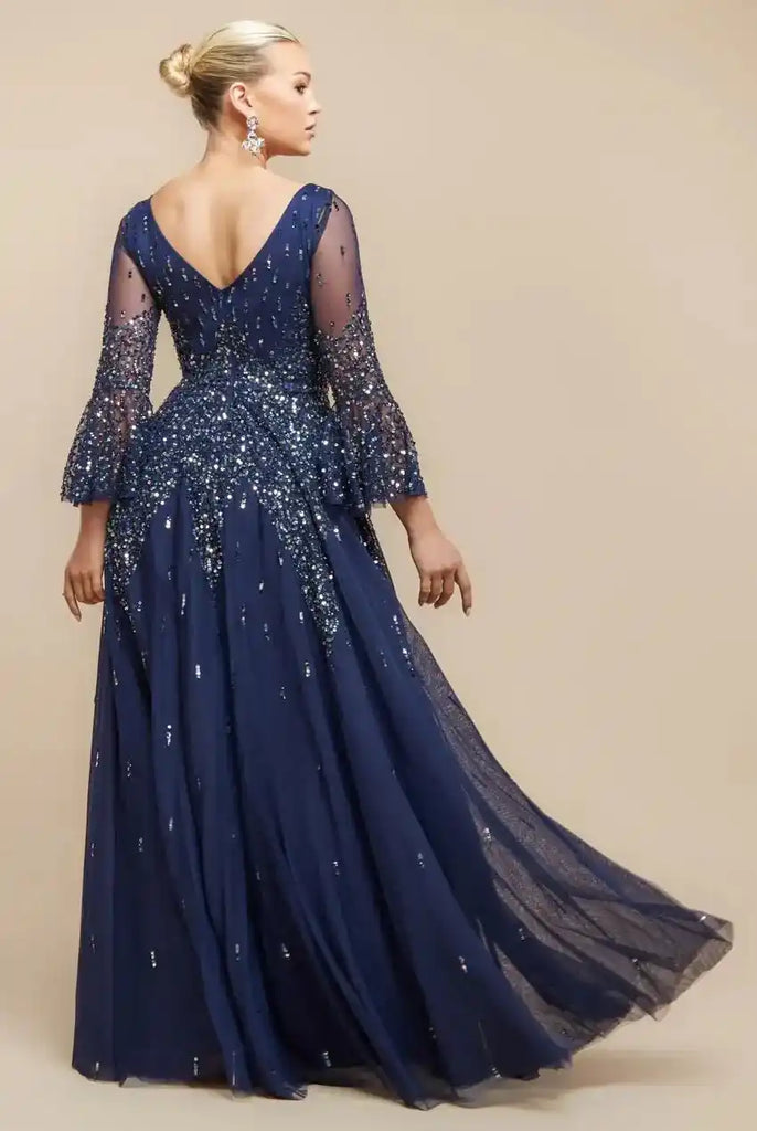 Goddiva Bell Sleeve Gown - Burgundy Sequin A-Line features shimmering sequins, sheer bell sleeves, and a flowing skirt, ideal for formal events.