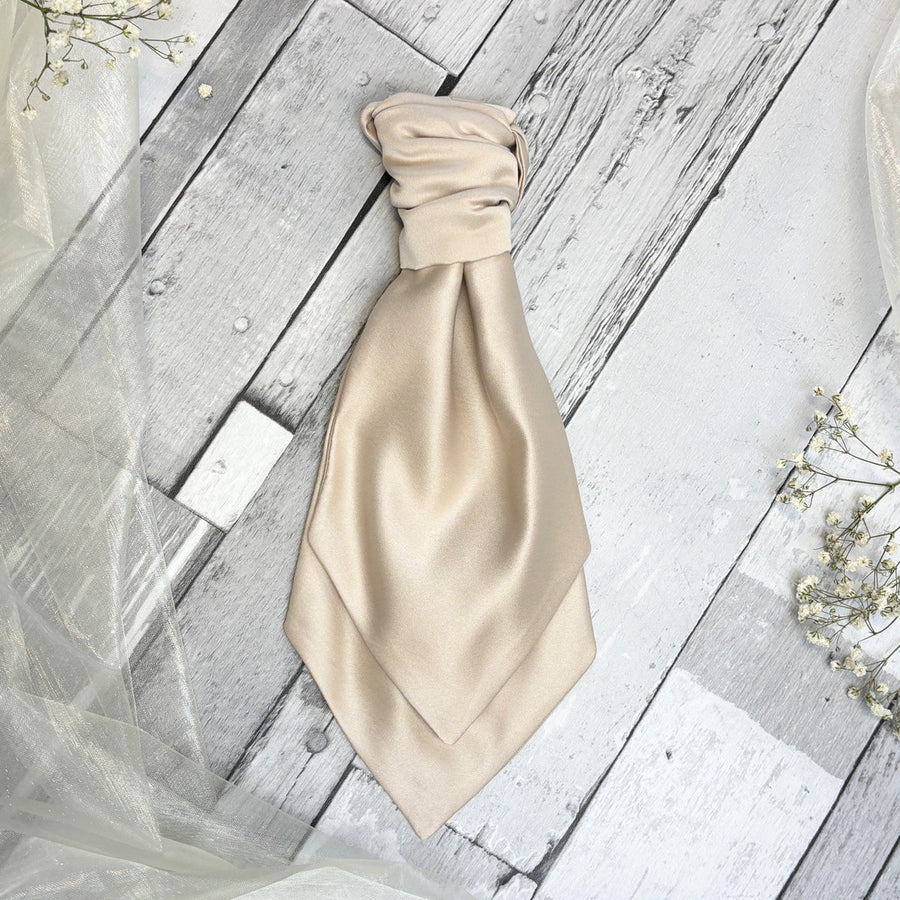 Handcrafted Antique Champagne Boys Wedding Cravat displayed on rustic wood background, ideal for groomsmen and page boys' wedding attire.
