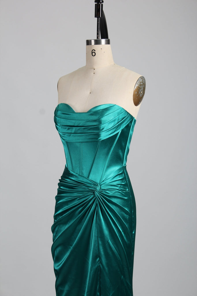 Kiya strapless teal satin prom dress with ruched bodice and high leg split, perfect for Prom 2024. Fitted design with corset-style structure.