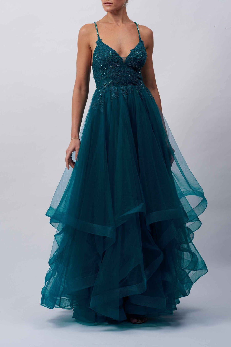 Teal Mascara MC110117 prom ballgown featuring a beaded lace bodice, sparkle straps, and layered tulle skirt. Ideal for prom or special occasions.