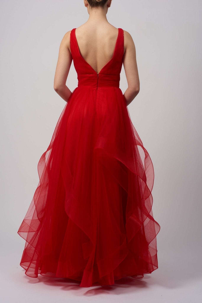 Back view of Mascara London MC11207 red tulle ballgown featuring a deep V back and tiered layers, perfect for red carpet or evening wear.