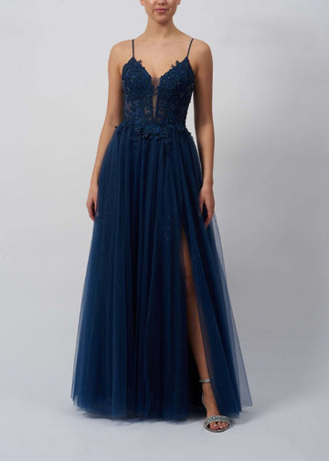 Mascara Navy Blue Ballgown MC11313 featuring floral appliqué bodice, tulle skirt, and thigh-high slit. Elegant choice for prom or formal events.