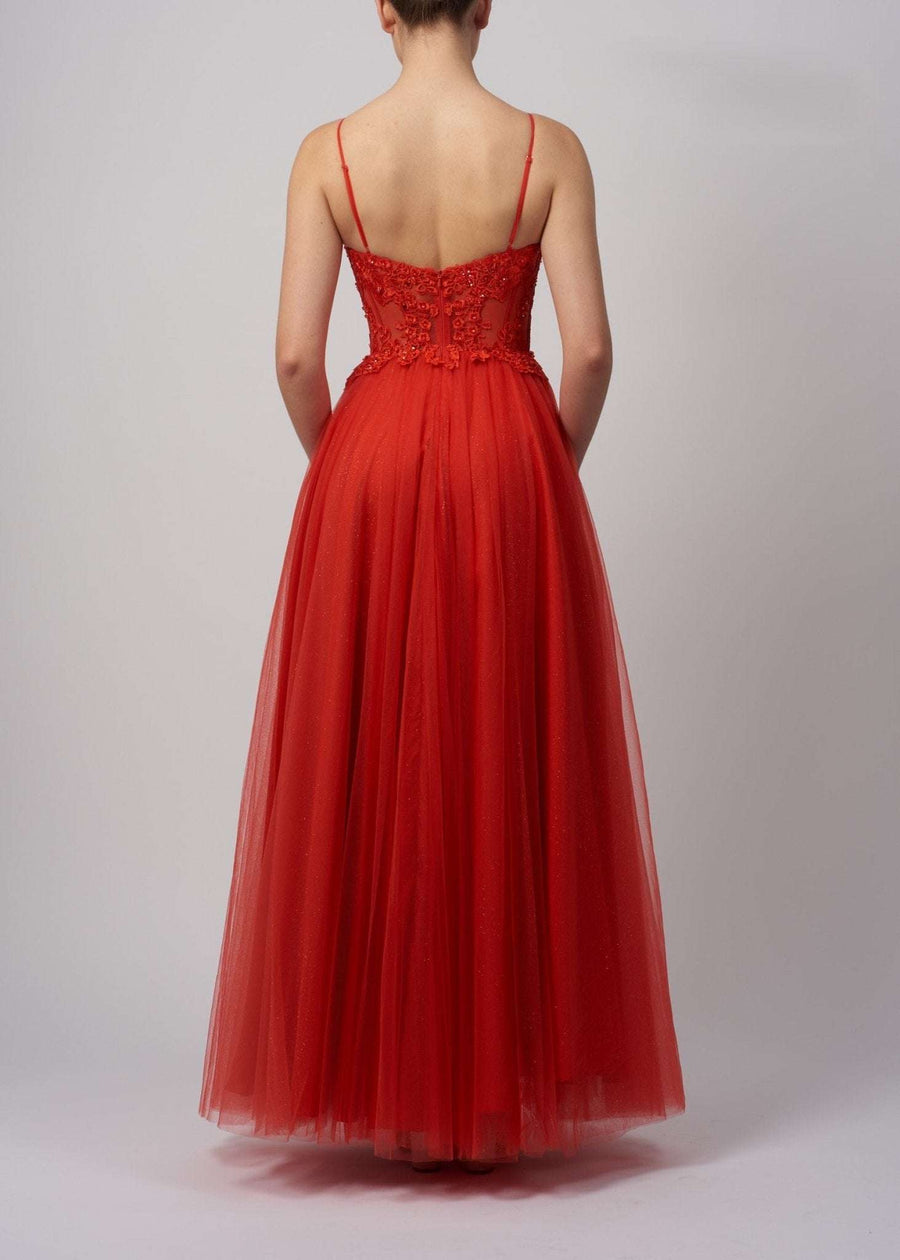 Back view of Mascara MC11313 Ballgown in tulle, showcasing floral lace bodice and flowing glitter skirt. Ideal for prom or formal events.