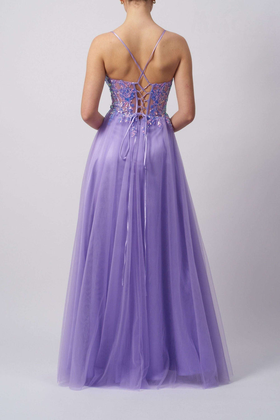 Mascara Lemon Tie Ballgown with lace-up back and flowing tulle skirt, ideal for proms and formal events. Elegant lemon hue enhances its charm.