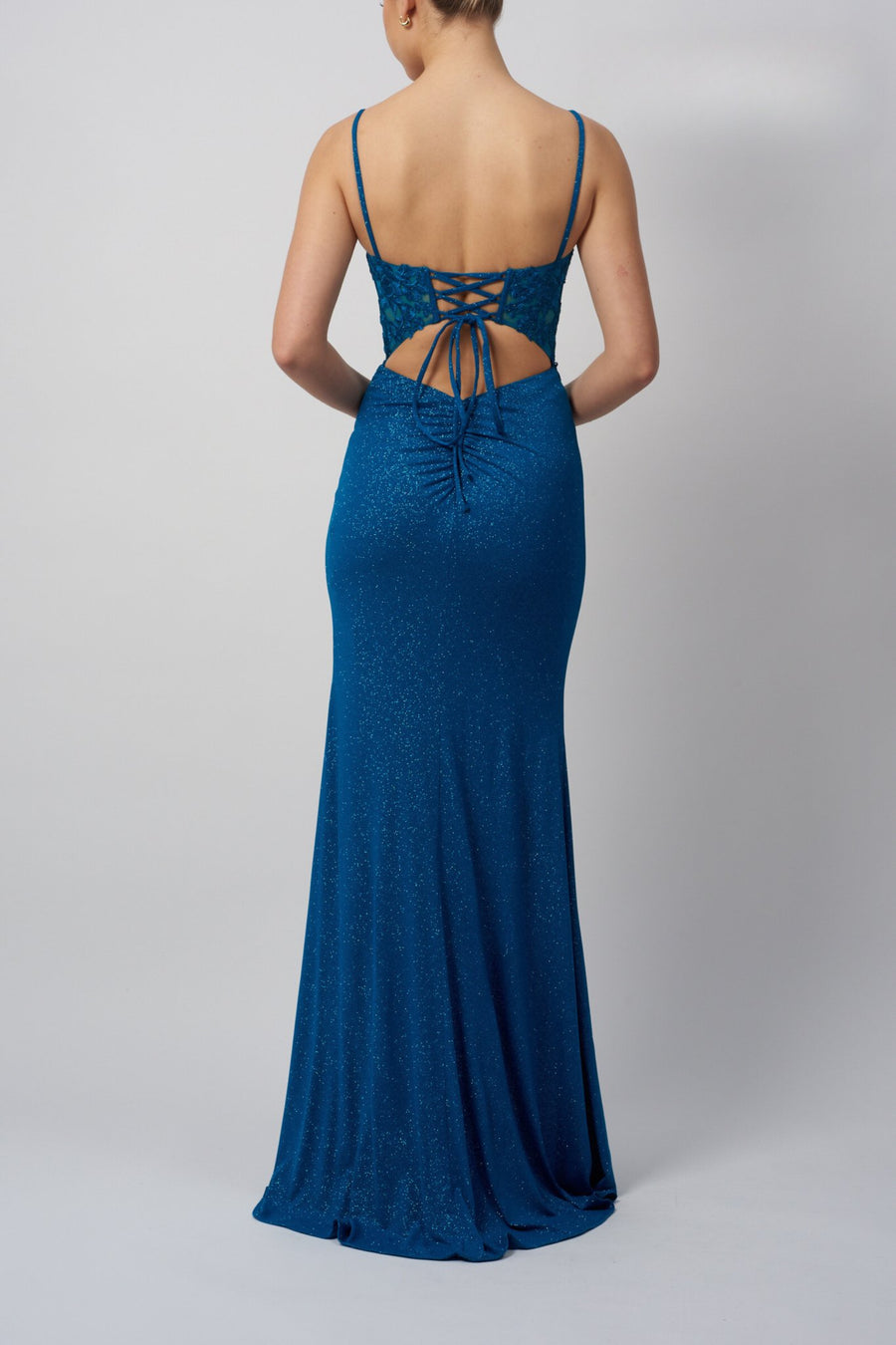 Back view of Mascara London MC11342 Navy Glitter Prom Dress with lace-up corset detail and shimmering fabric, perfect for red carpet-ready elegance.
