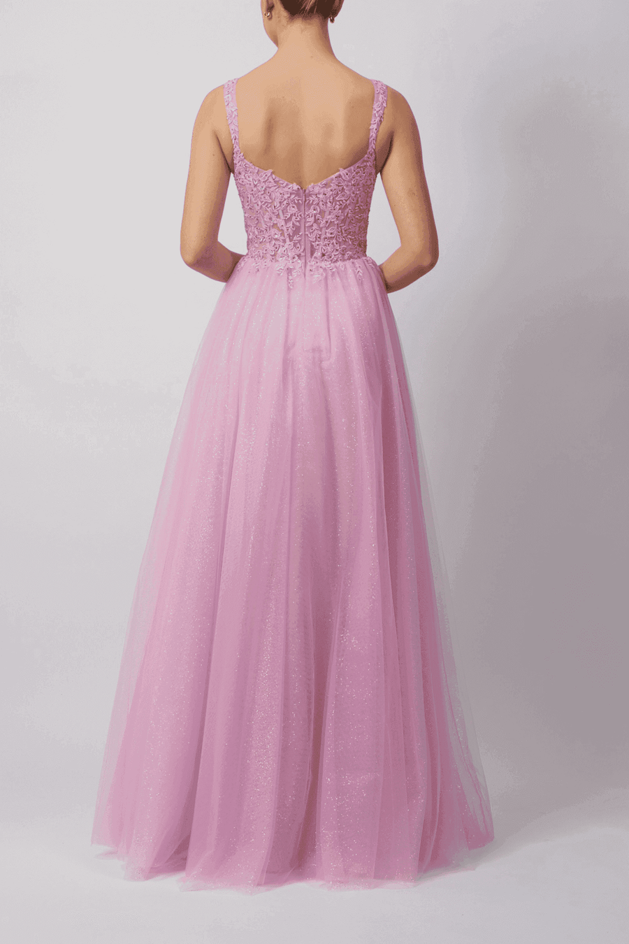 Back view of Mascara MC11347 Prom Gown in Navy, shown in pink variant with embellished bodice and flowing glitter tulle skirt.