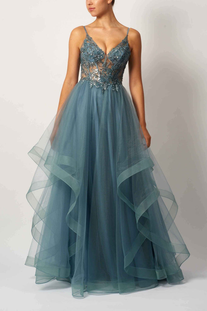 Tulle ball gown prom dress in navy blue with floral appliqué and sequin bodice, featuring a plunging neckline and layered voluminous skirt.