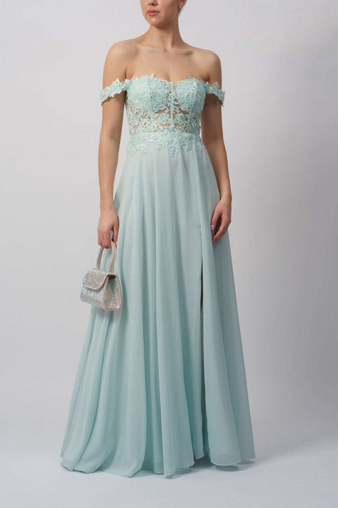 model in an off the should mint bridesmaid dress