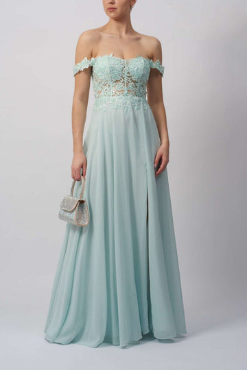 model in an off the should mint bridesmaid dress