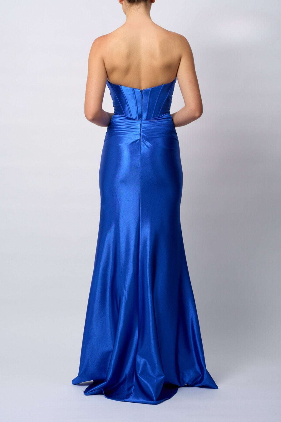 Back view of Mascara Petrol Satin Pleated Dress MC119421 showcasing a sleek strapless satin finish and elegant mermaid silhouette for formal occasions.