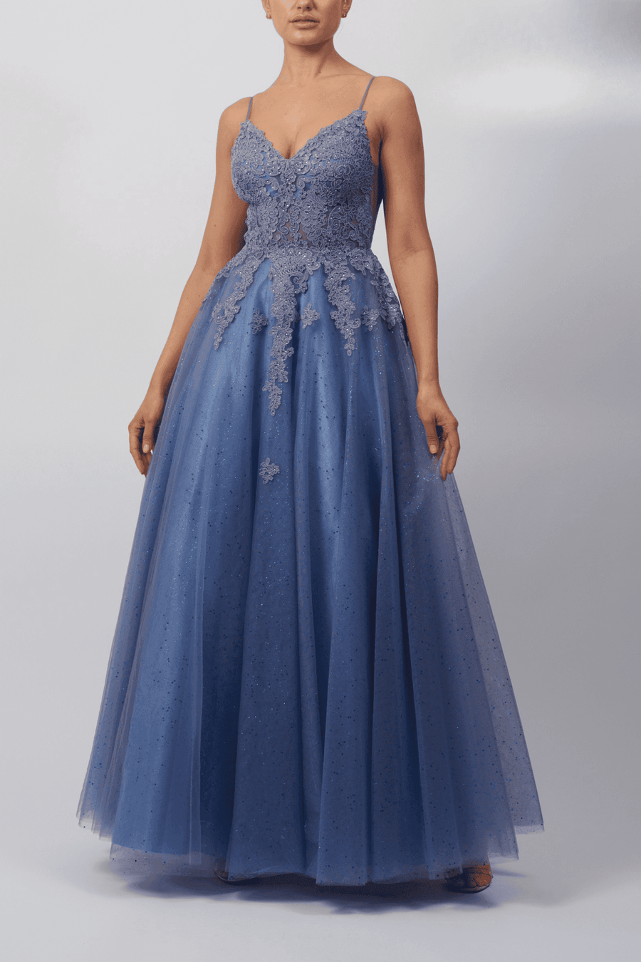 Mascara Blue Ballgown - Steele Tulle Dress 2025 features a lace bodice with spaghetti straps and a full glitter tulle skirt, ideal for prom or gala events.