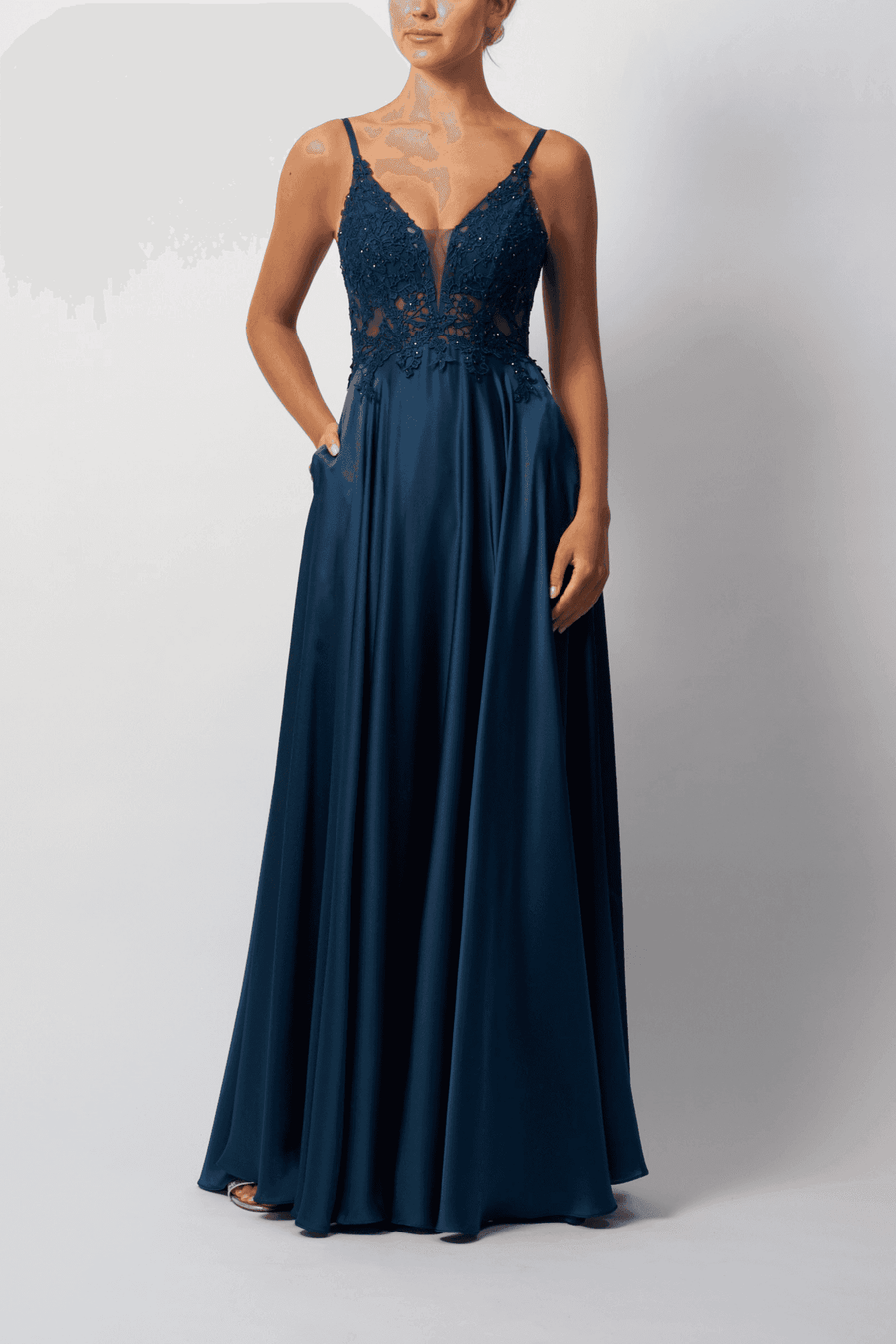 Airforce Blue Satin Dress with lace bodice and deep V neckline, ideal for prom or black tie events. Features flowing satin skirt and elegant embroidery.