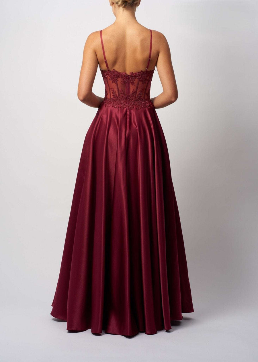 Mascara MC123216 Navy Satin Ballgown with Corset Detail Dress featuring a sheer embellished corset bodice and full satin skirt, shown from the back.