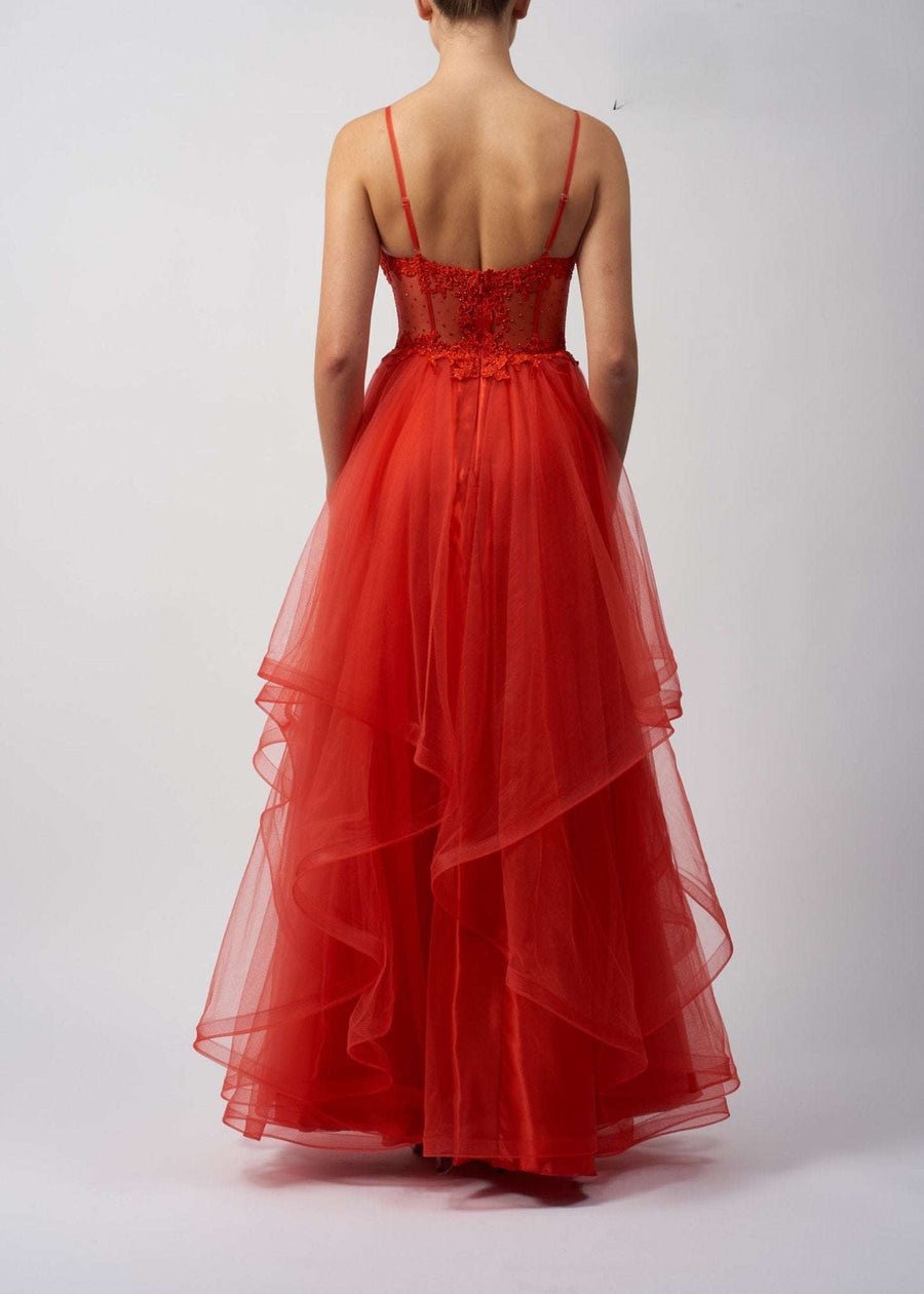 Mascara London Ballgown in forest green shown in back view with layered tulle skirt and delicate straps, perfect for prom or red carpet events.