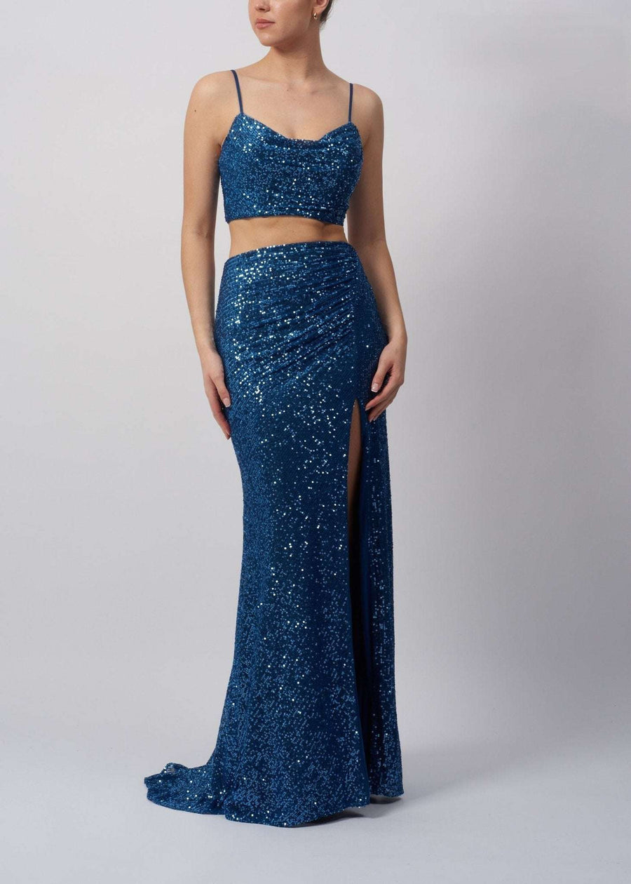 Steele Blue Sequin Mascara Twin Set MC18326 featuring a fitted crop top and high-slit maxi skirt, perfect for prom or red carpet events.