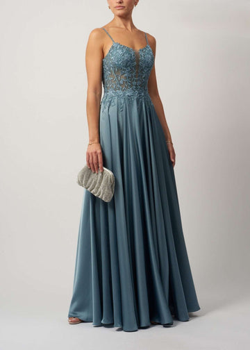 Dew Corset Dress in steel blue satin with lace applique bodice, sparkly gem straps, and flowing skirt. Ideal for bridesmaids or elegant events.