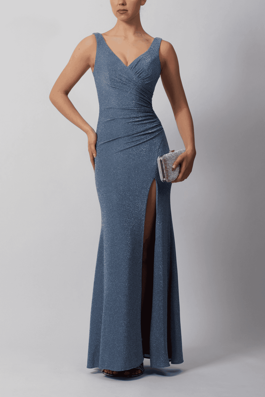 Steele Blue Evening Gown with sparkle, featuring a fitted V-neck design and thigh-high slit, ideal as a summer wedding guest dress or prom gown.