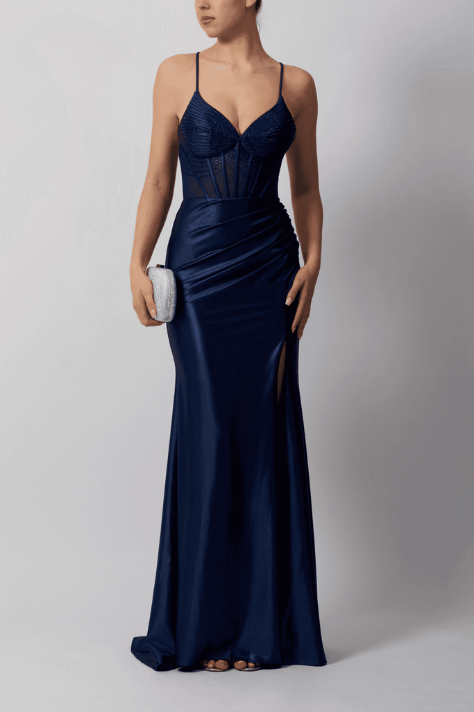 Navy fitted evening gown with beaded corset bodice, ruched jersey skirt and side split, perfect for summer formal events