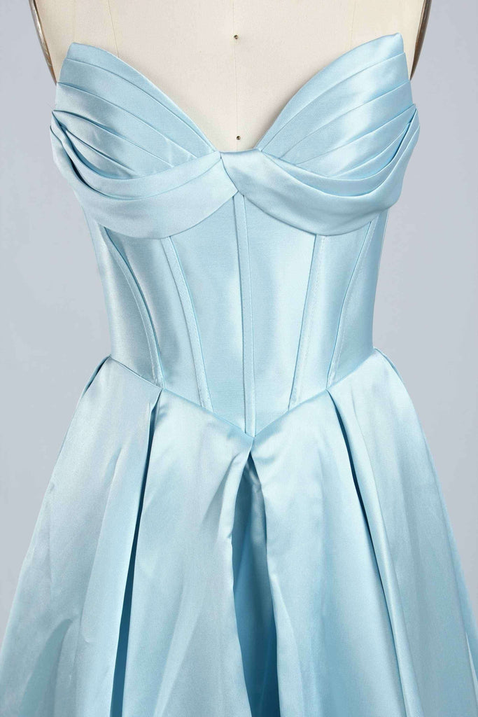 Close-up of ruched bustier and structured bodice on the Phoebe Prom Gown in light blue satin, highlighting elegant detailing.