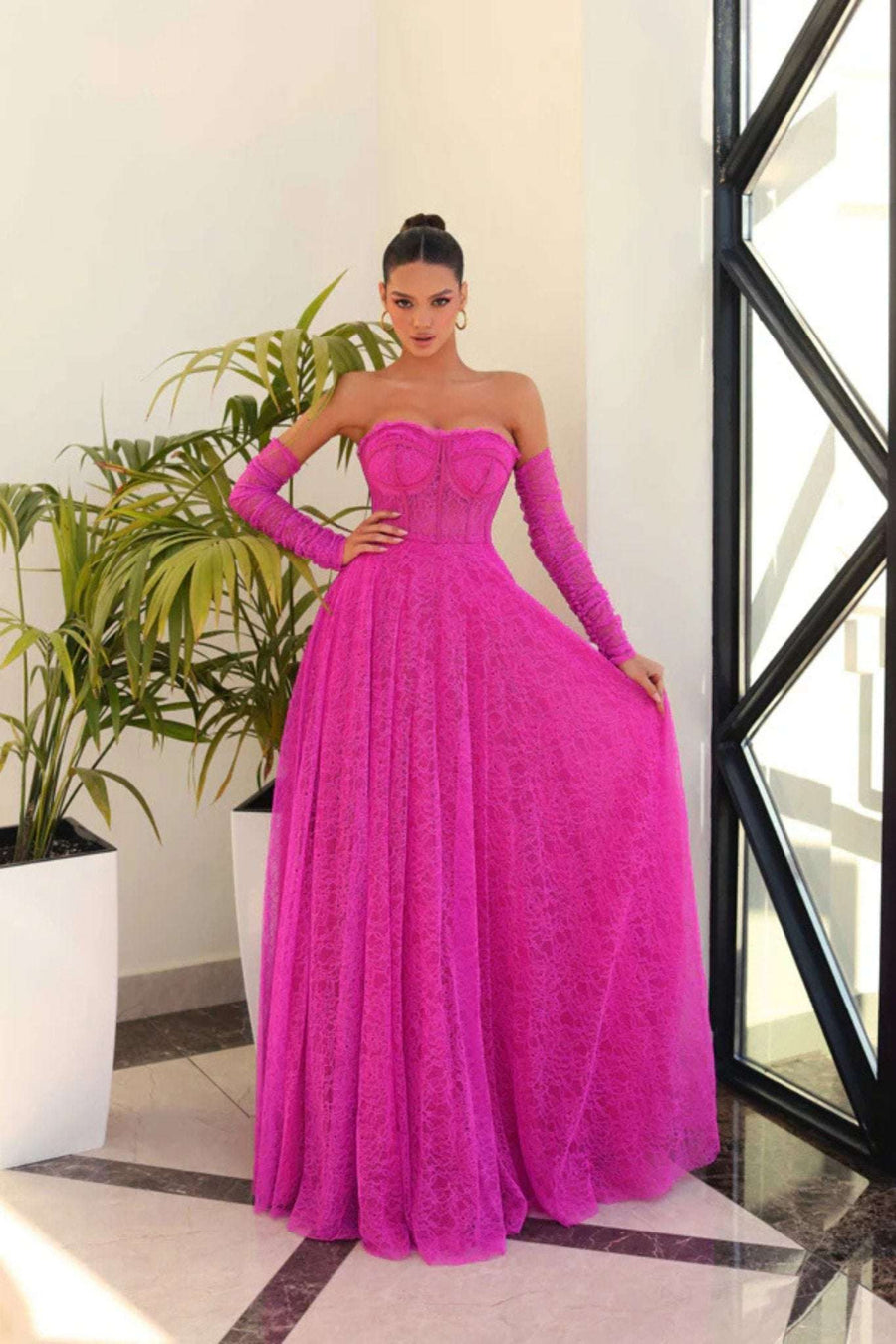 Strapless Lace Ballgown - Magenta Pink NC1005 featuring a corset bodice and full-length lace skirt, perfect for prom or red carpet events.