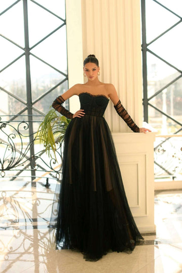 NC1064 Strapless Tulle Gown - Black Nude with sheer corset bodice, sweetheart neckline, and full A-line tulle skirt, styled with mesh gloves.