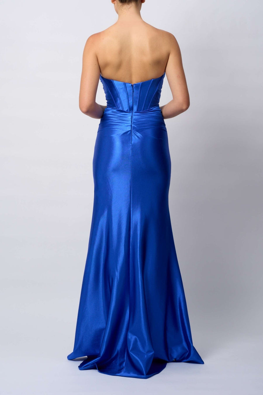 Back view of Royal Blue Corset Dress - Satin Evening Gown by Mascara MC119421 with structured fit, pleated waist, and elegant floor-length hem.
