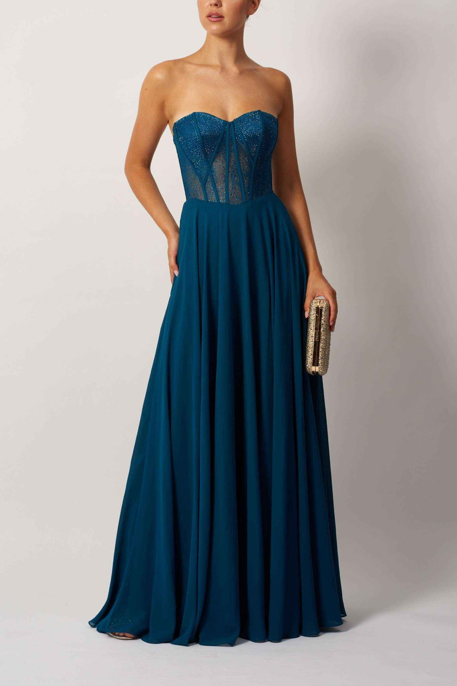 Teal lace chiffon dress with structured corset bodice and sweetheart neckline, perfect for prom or red carpet occasions.