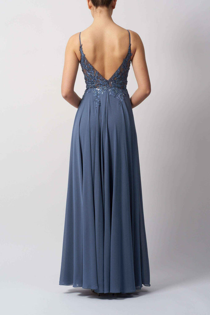 MC19442 Bridesmaid Dress - Chiffon by Mascara London in dusty blue, featuring a deep V-back, sequin lace bodice, and flowing chiffon skirt. Ideal for weddings or formal events.