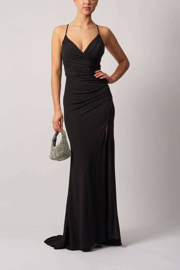 Mascara Tie Back Glitter Dress in black with sequin detailing, featuring a thigh-high leg split and custom fit for formal events and black-tie galas.