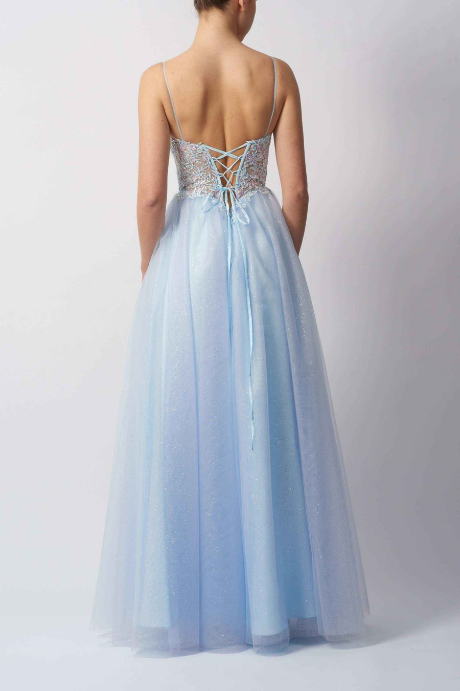 Back view of Mascara MC11514 Baby Blue Tulle Prom Dress with lace-up corset detail and shimmering tulle skirt, perfect for prom night elegance.