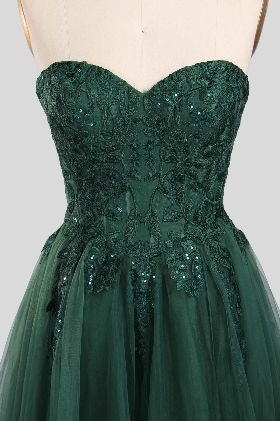 Jessica Stuart Luna strapless sequin ballgown in emerald green with lace bodice and tulle skirt, ideal for prom or evening events.