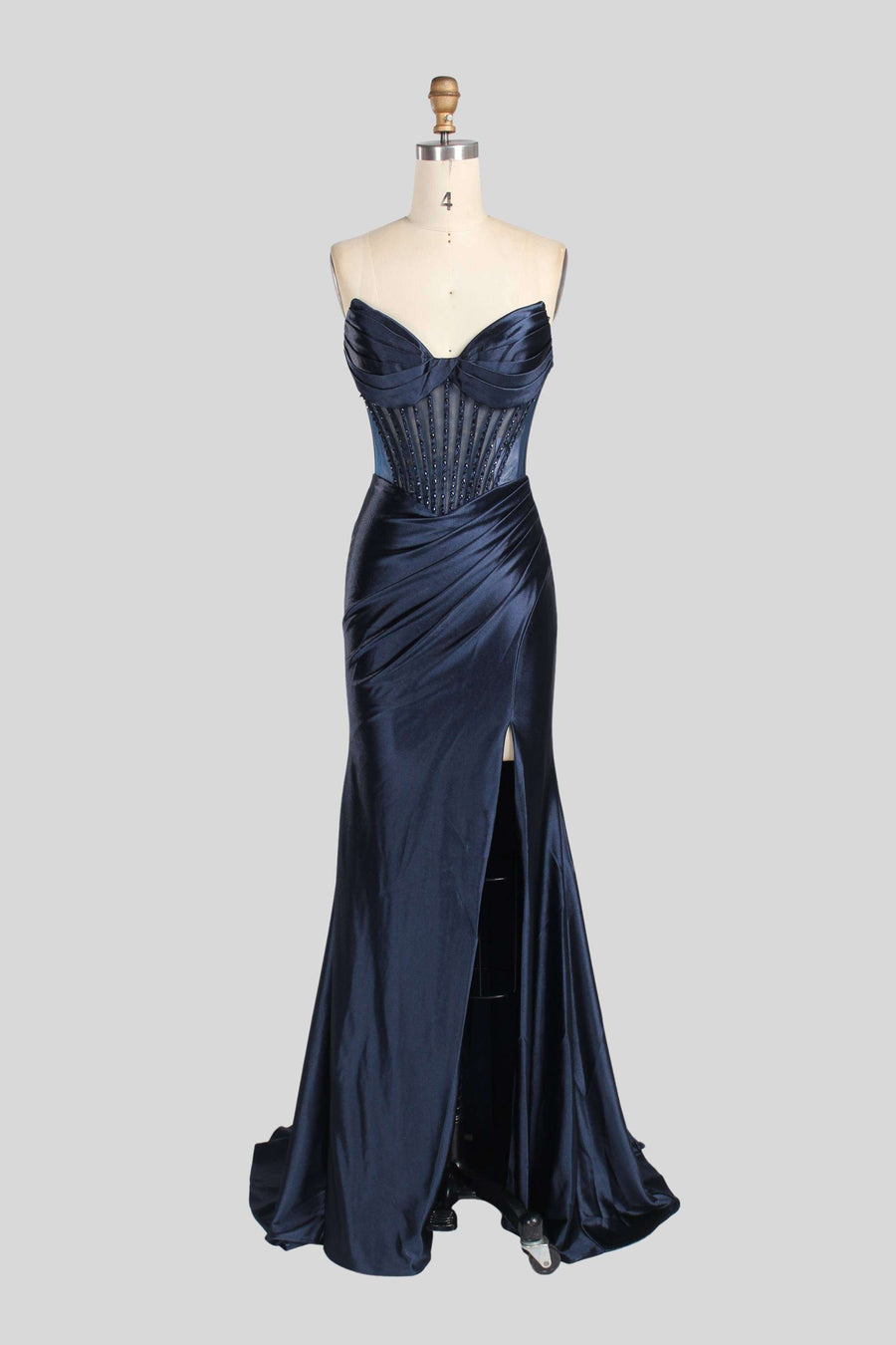 Annabelle Strapless Gown in navy satin with crystal-embellished corset bodice, sweetheart neckline, and thigh-high slit for weddings or galas.