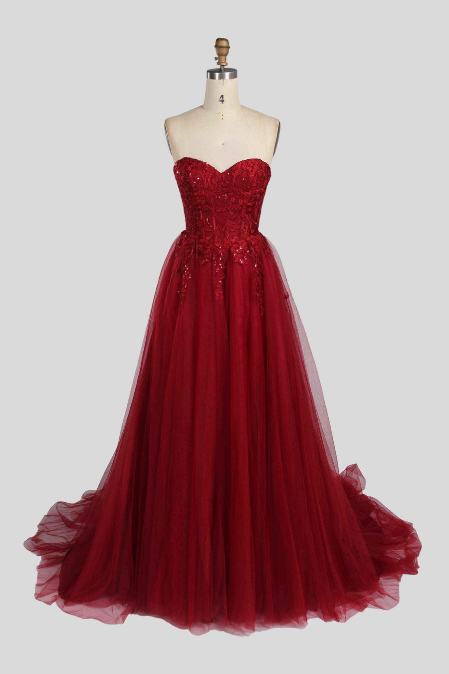 Jessica Stuart Luna strapless sequin ballgown in wine red with sweetheart neckline and flowing tulle skirt, ideal for prom or evening events.