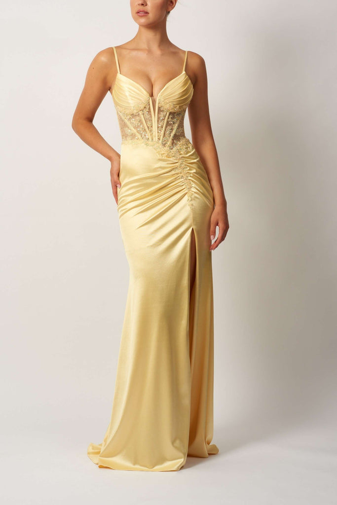 Lemon pleated jersey dress MC11522 by Mascara featuring a pleated bust, sheer lace bodice, and thigh-high slit, ideal for prom or evening wear.