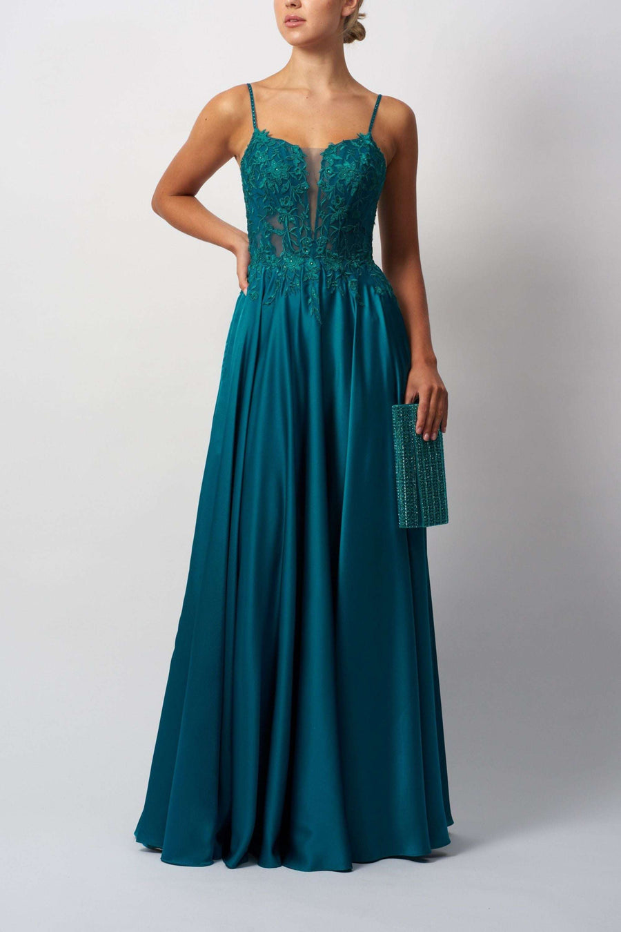 Mascara MC192045 Dress in petrol blue with corset bodice, lace appliqué, and satin skirt. Elegant cross back design for prom or evening events.