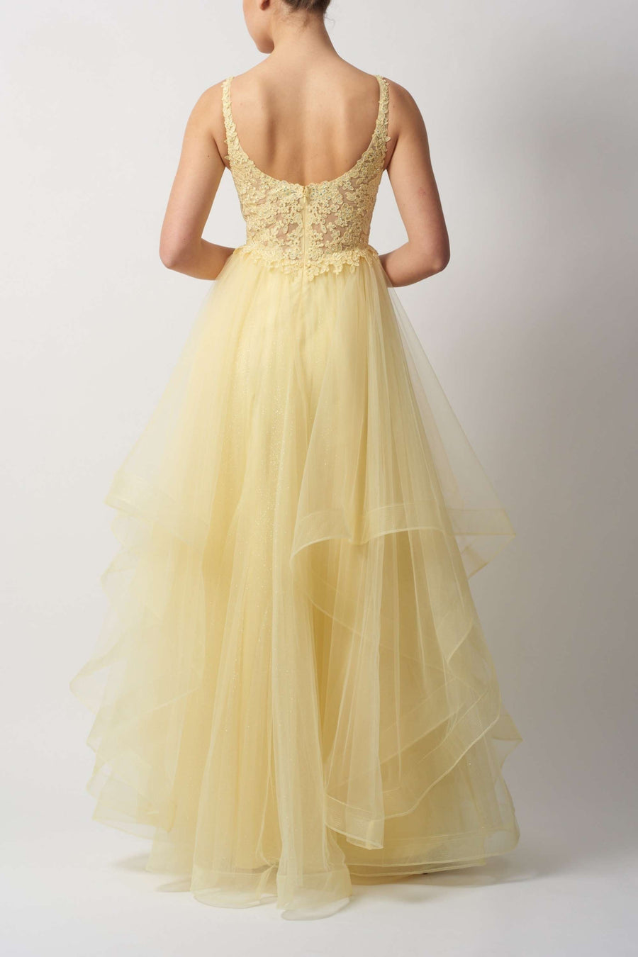 Back view of Mascara MC12515 Double Tulle Blue Gown in soft yellow, featuring layered tulle skirt and lace bodice for prom or bridesmaid wear.