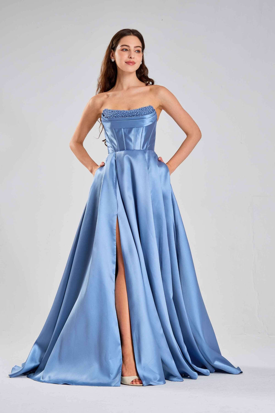 Jessica Stuart Steele Blue Pearl Evening Gown 33219B with strapless pearl-embellished bodice and thigh-high slit, ideal for galas and proms.