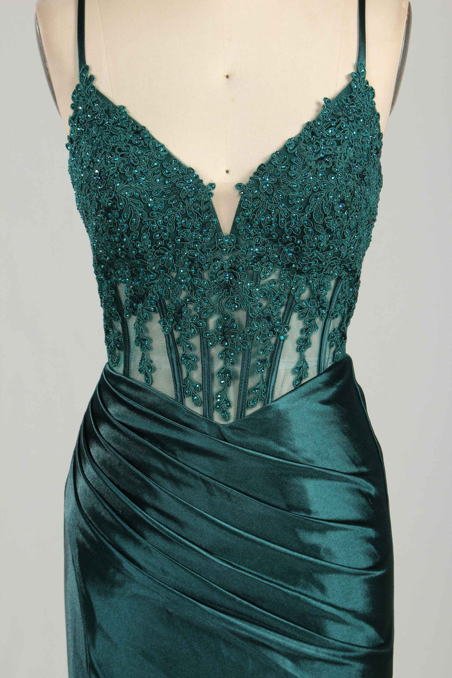 Close-up of Blake Dark Teal Satin Prom Dress by Jessica Stuart highlighting intricate lace corset bodice with beaded embellishments. Perfect for prom or red carpet.