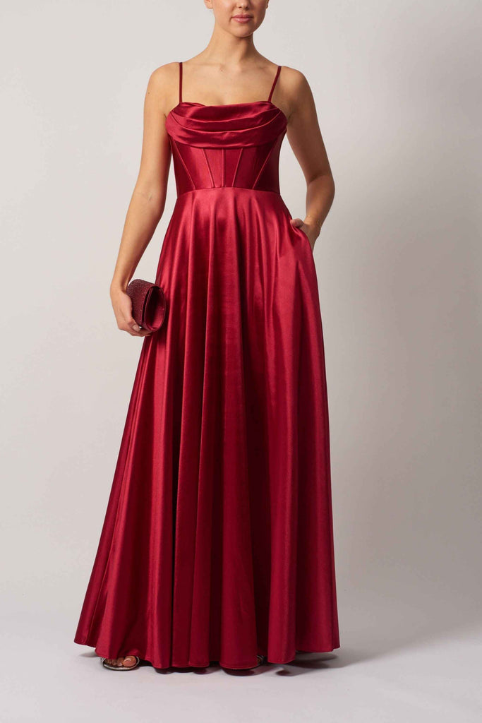 Mascara Berry Prom Dress with cowl neckline and A-line silhouette in satin fabric, featuring hidden pockets and spaghetti straps.