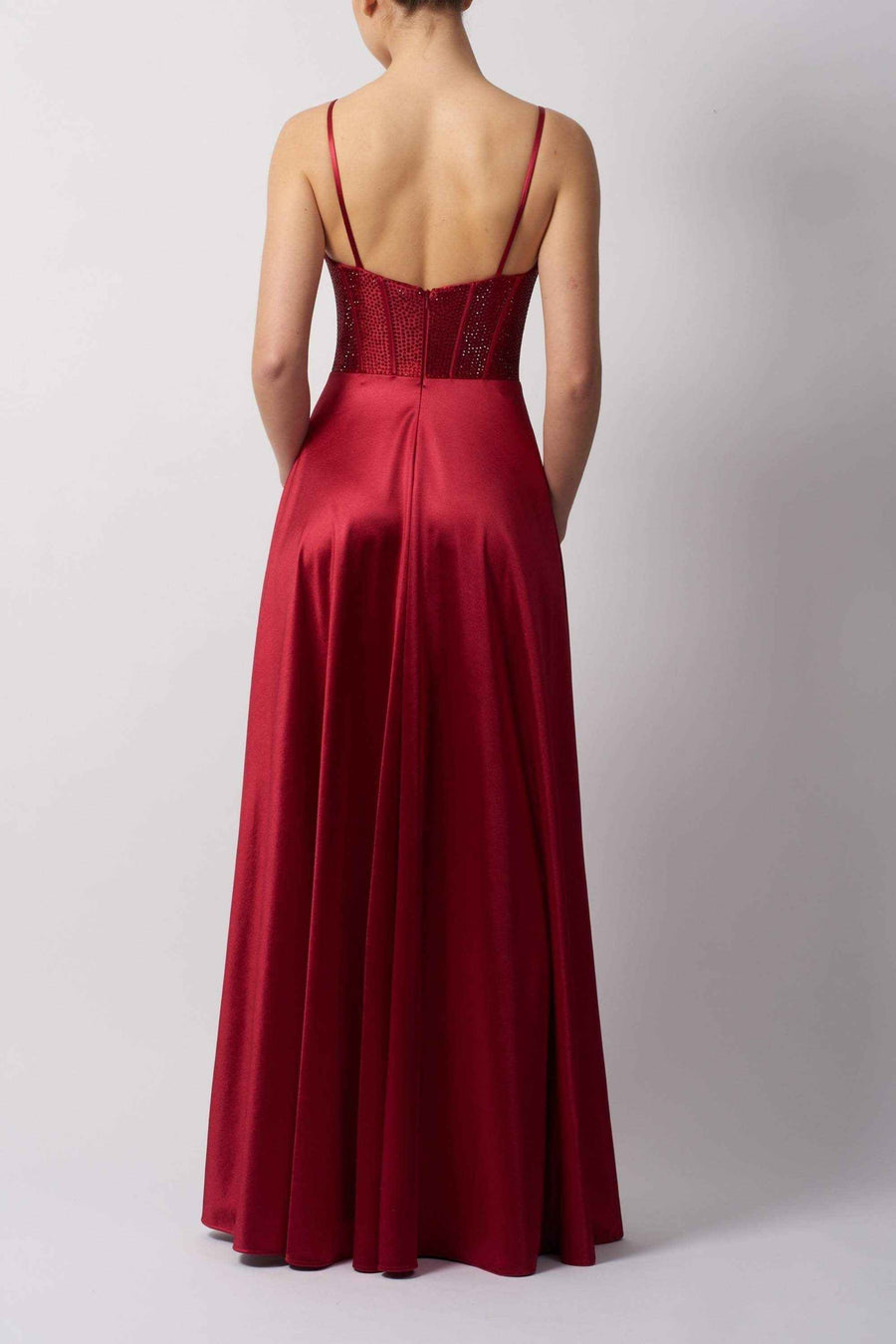 Back view of Hot Fix Forest Green Jersey Gown showcasing low-cut back, fitted bodice, and flowing skirt for elegant formal wear.