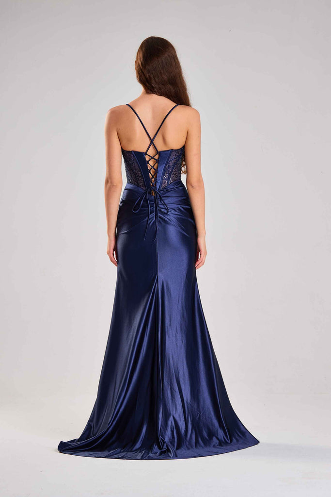 Back view of Jessica Stuart Midnight Navy Satin Corset Gown featuring lace-up corset detailing and a flowing satin train, perfect for formal occasions.