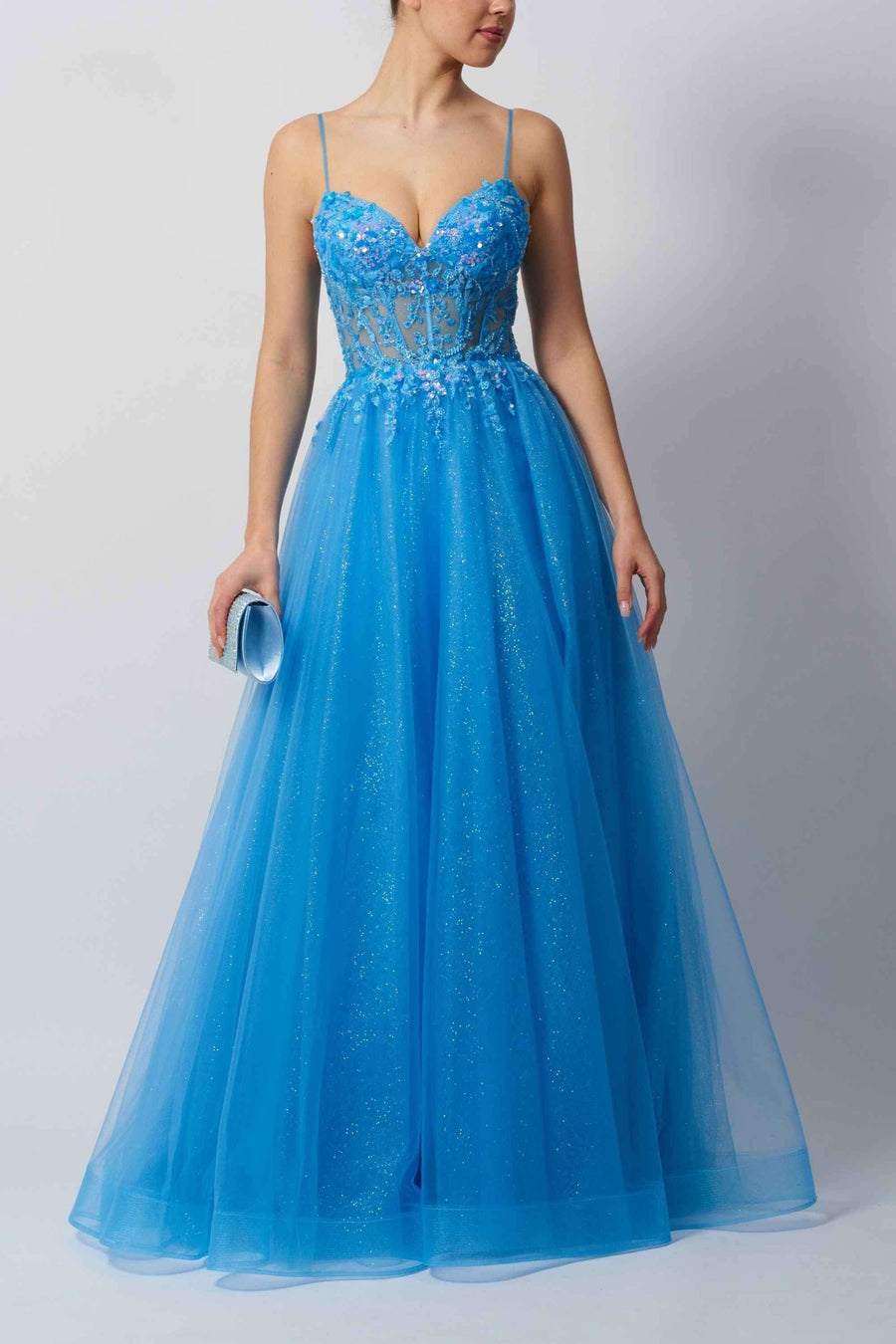 MC11348 Powder Blue Gown with beaded bodice and glitter tulle skirt, ideal for prom, gala, or red carpet events in elegant eveningwear style.