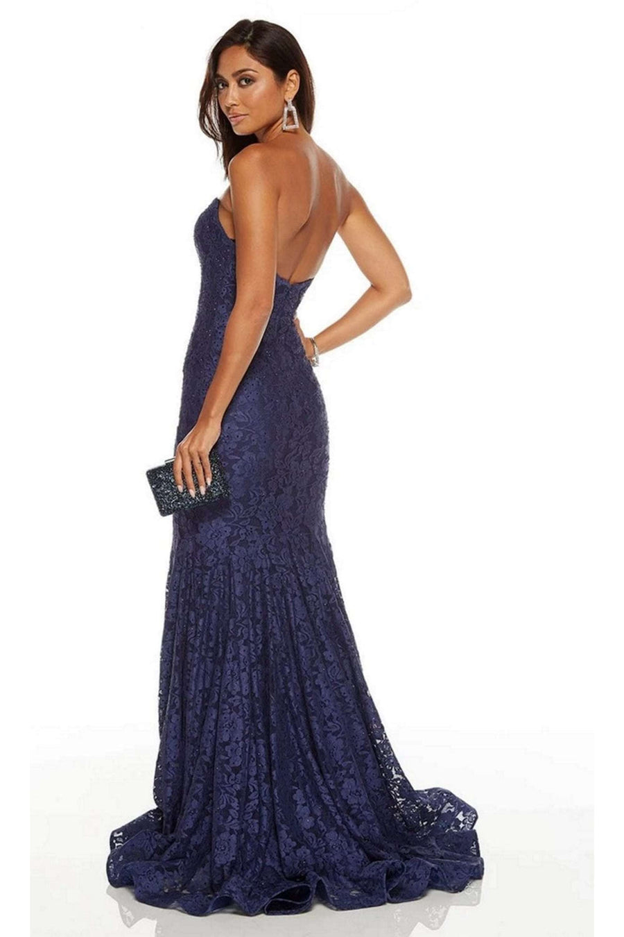 model facing sidewides in a full length strapless lace navy dress