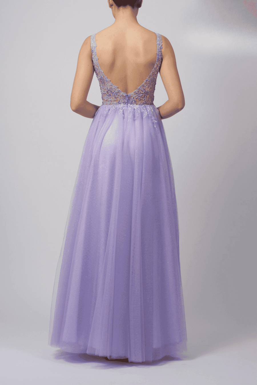 Back view of Mascara London MC113117 lilac tulle prom dress featuring deep V-back and flowing silhouette for elegant evening wear.