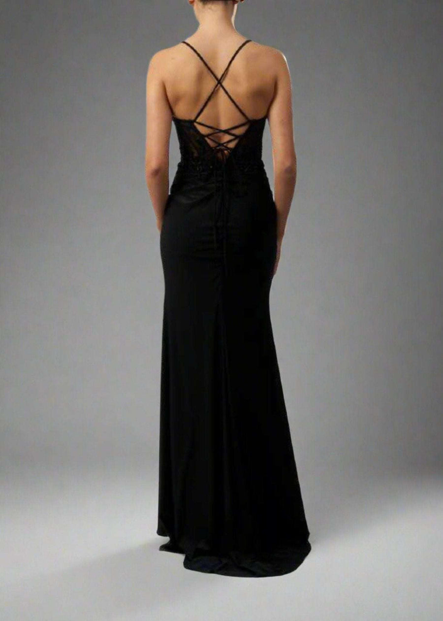 Back view of Mascara MC11324 fitted prom dress in black, featuring lace-up string tie open back and floor-length silhouette for formal occasions.