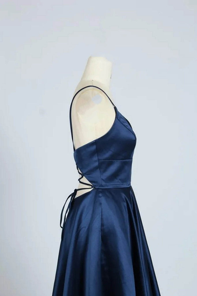 Navy Blue AVA Dress with full skirt and open lace-up back, showcasing elegant formal style for prom or evening events.