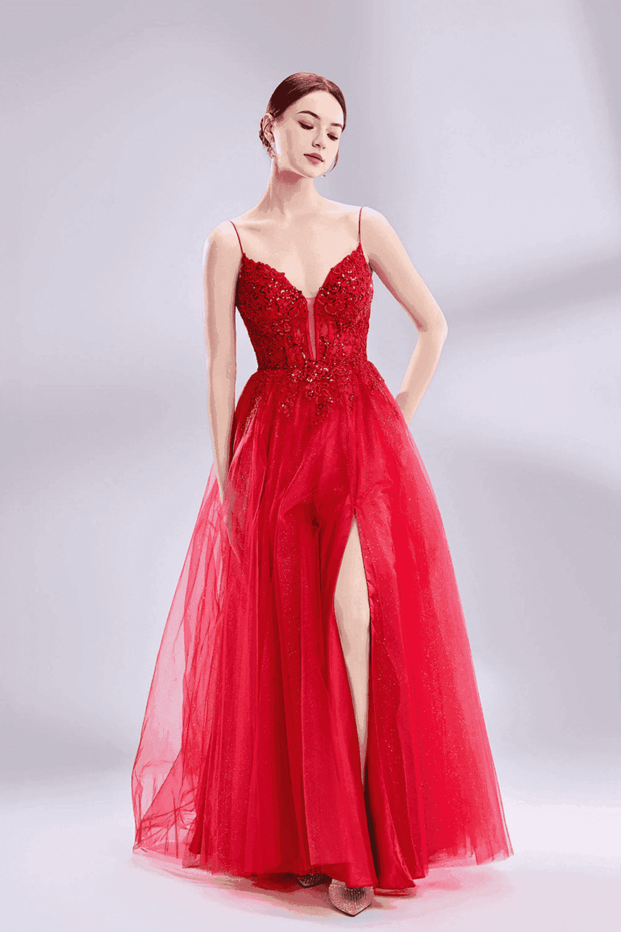 Prom Dress - Ball Gown style shown in red with spaghetti straps, beaded bodice, V-neckline, and thigh-high side slit. Ideal for formal events.