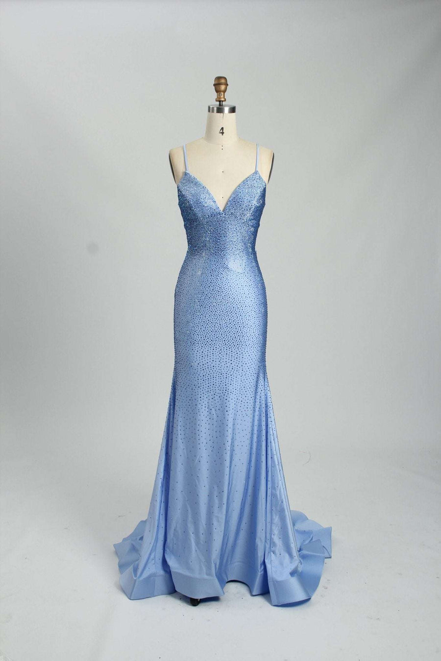 Poppy Long Prom Dress - Blue Rhinestone features a slim fit satin gown with full rhinestone embellishments, thin straps, and a dramatic train.