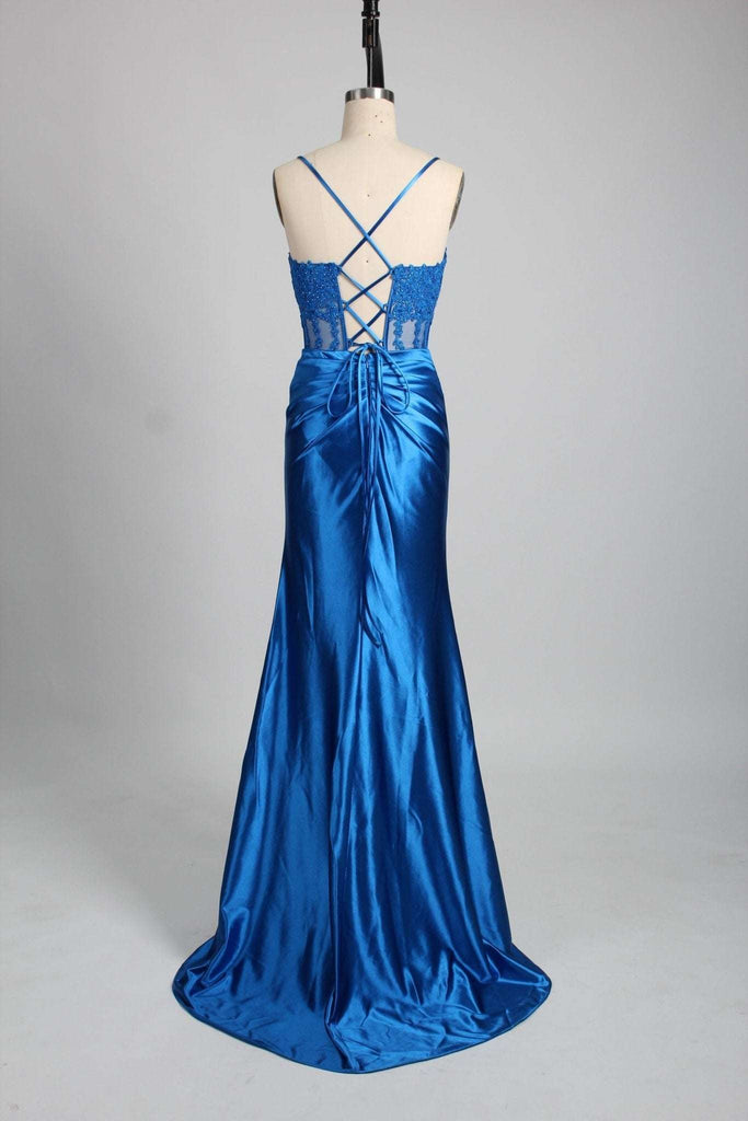 Back view of Blake Prom Dress in royal blue satin with lace-up corset bodice and pleated floor-length skirt. Elegant tie-back design for prom.